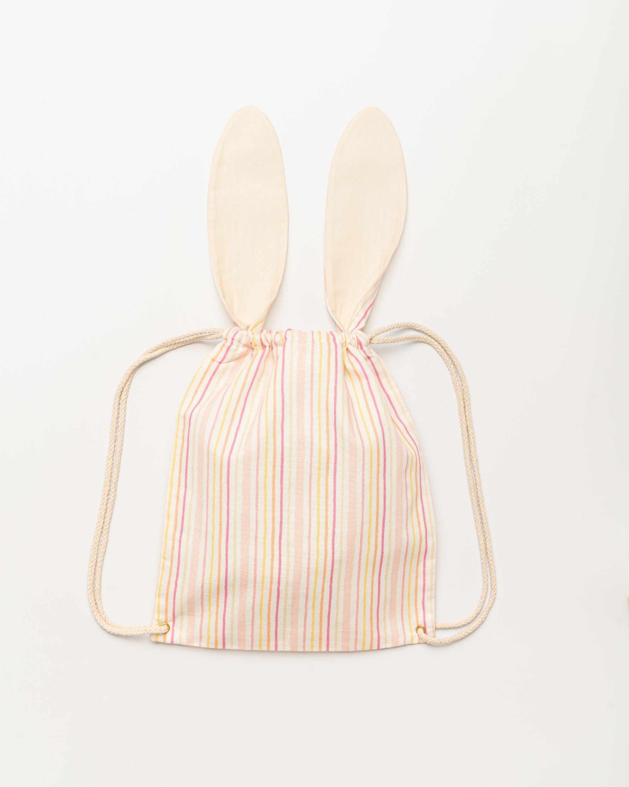 Early Sunday, Bunny Drawstring Backpack in Pink Stripes print, made from Printed 70% Cotton, 30% Linen fabric, featuring a bunny-ear design with a drawstring closure, shown in a back flat-lay view