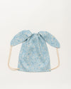 Early Sunday, Bunny Drawstring Backpack in Tonal Floral Blue color, made from Printed Cotton Tiny Swiss Dobby fabric, featuring a bunny-ear design with a drawstring closure, shown in a back flat-lay view