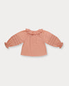 Early Sunday, Cécile Blouse in Blush, made from Cotton Swiss Dobby fabric, featuring a relaxed silhouette with gathered sleeves and delicate detailing, shown in a back flat-lay view