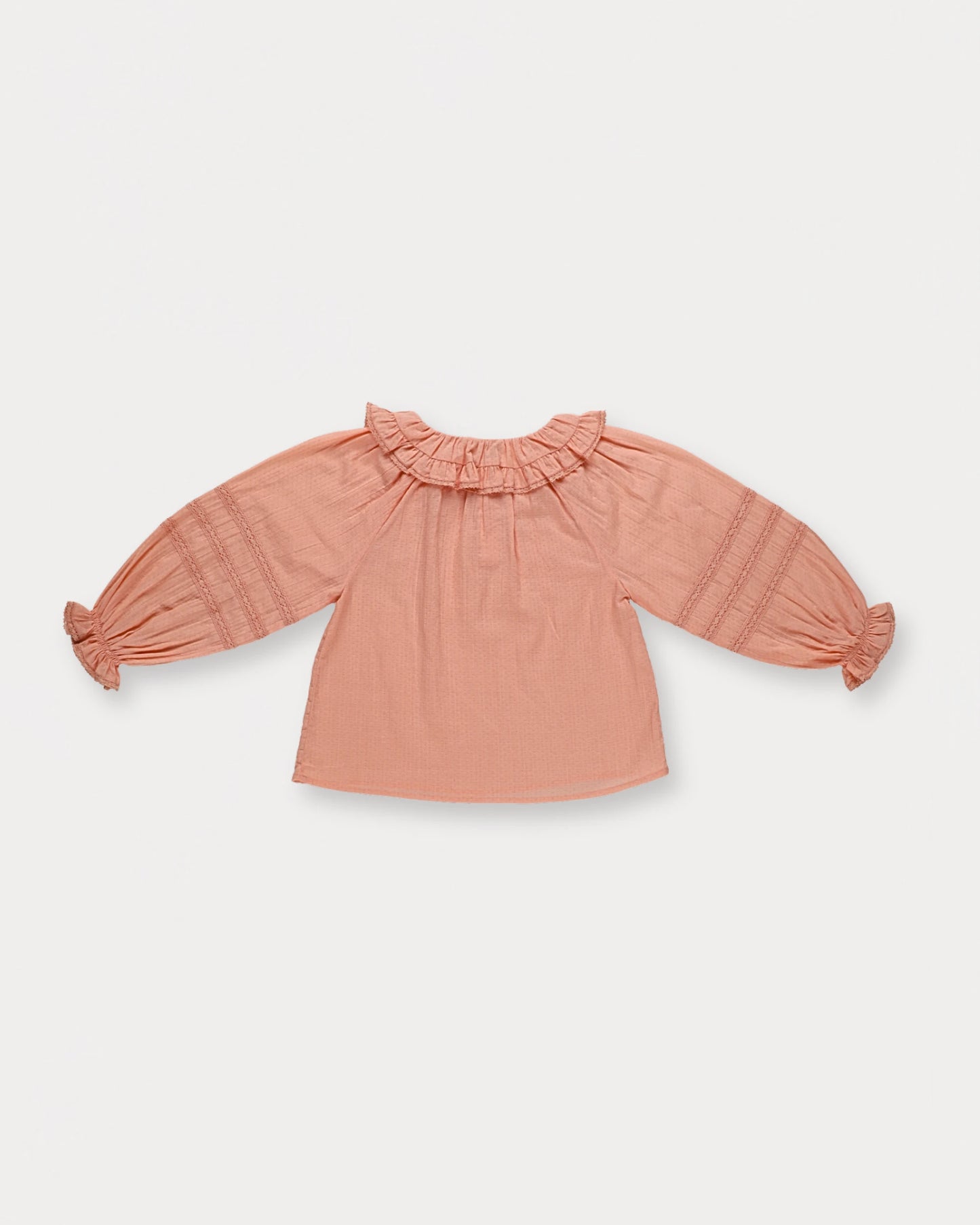 Early Sunday, Cécile Blouse in Blush, made from Cotton Swiss Dobby fabric, featuring a relaxed silhouette with gathered sleeves and delicate detailing, shown in a back flat-lay view