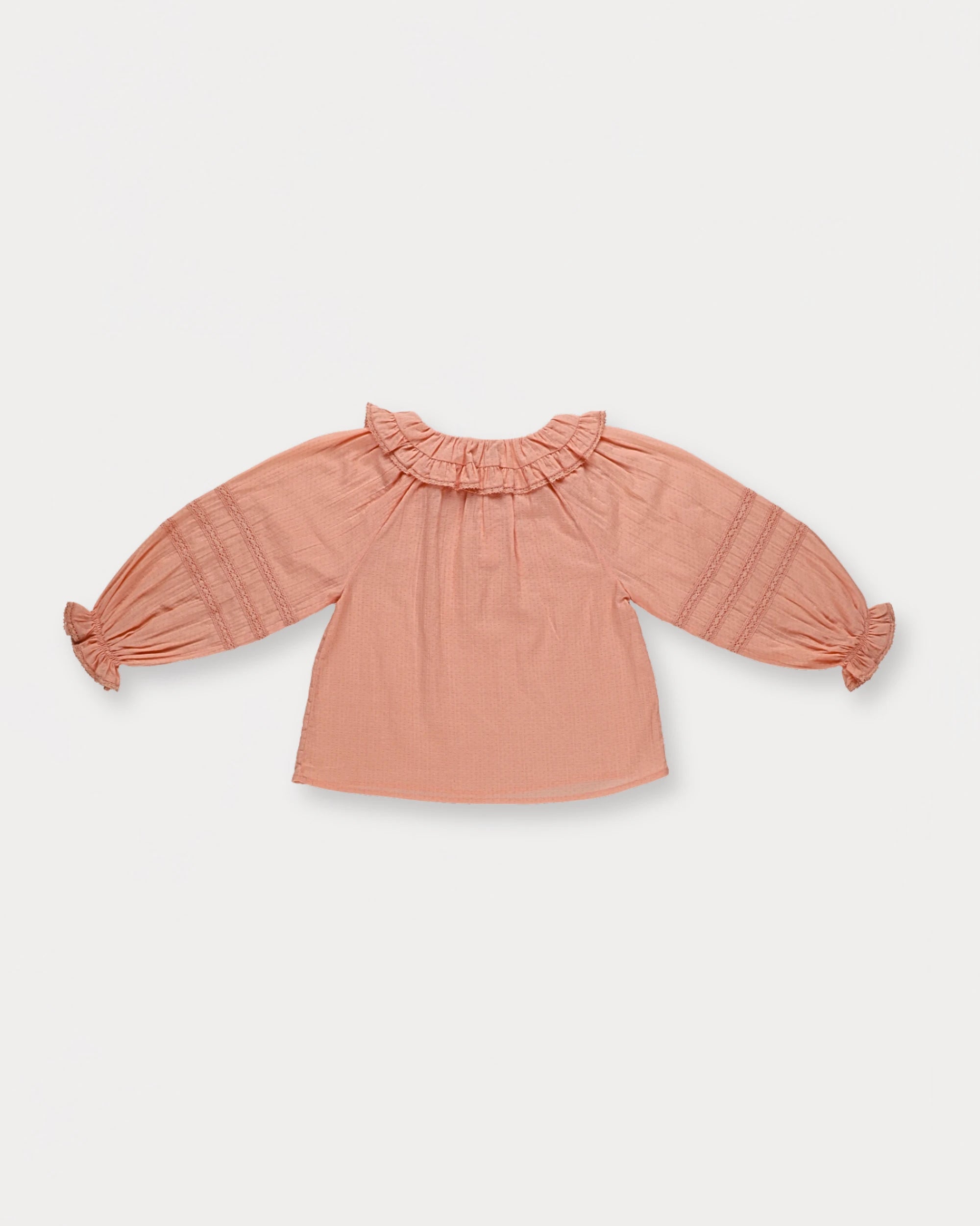Early Sunday, Cécile Blouse in Blush, made from Cotton Swiss Dobby fabric, featuring a relaxed silhouette with gathered sleeves and delicate detailing, shown in a back flat-lay view
