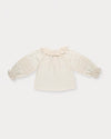 Early Sunday, Cécile Blouse in Ecru, made from Cotton Swiss Dobby fabric, featuring a relaxed silhouette with gathered sleeves and delicate detailing, shown in a back flat-lay view
