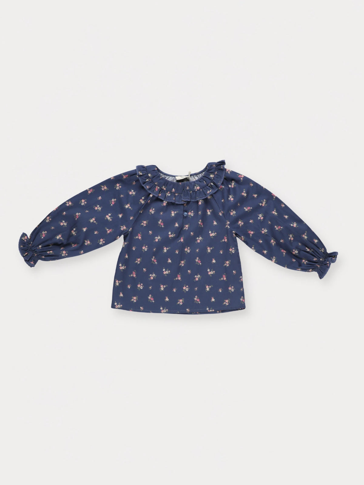 Early Sunday, Cécile Blouse in Ditsy Bouquet Navy, made from Printed Cotton Satin fabric, featuring a relaxed silhouette with gathered sleeves and delicate detailing, shown in a front flat-lay view