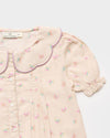 Early Sunday, Camelia Blouse in Butterfly Print color, made from printed cotton tiny swiss dobby fabric, featuring short sleeves with peter pan collar, shown in a closeup flat-lay view