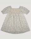 Early Sunday, Caroline Dress in Amelia print, made from Printed Cotton Cambric fabric, featuring tiered silhouette with thoughtful details for a feminine and relaxed look, shown in a front flat-lay view