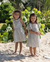 Early Sunday, Caroline Dress in Amelia print, made from Printed Cotton Cambric fabric, featuring tiered silhouette with thoughtful details for a feminine and relaxed look, shown in a front view of model wearing it
