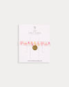 Early Sunday, Charm Bracelet in Pink Stripes print, made from Printed 70% Cotton, 30% Linen fabric, featuring a soft fabric bracelet design with a charm, shown in a front flat-lay view