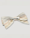 Early Sunday, Chiara Alligator Clip in Mini Flower print, made from Printed canvas 70% Cotton 30% Linen fabric, featuring a bow design on an alligator clip with a secure fit, shown in a back flat-lay view