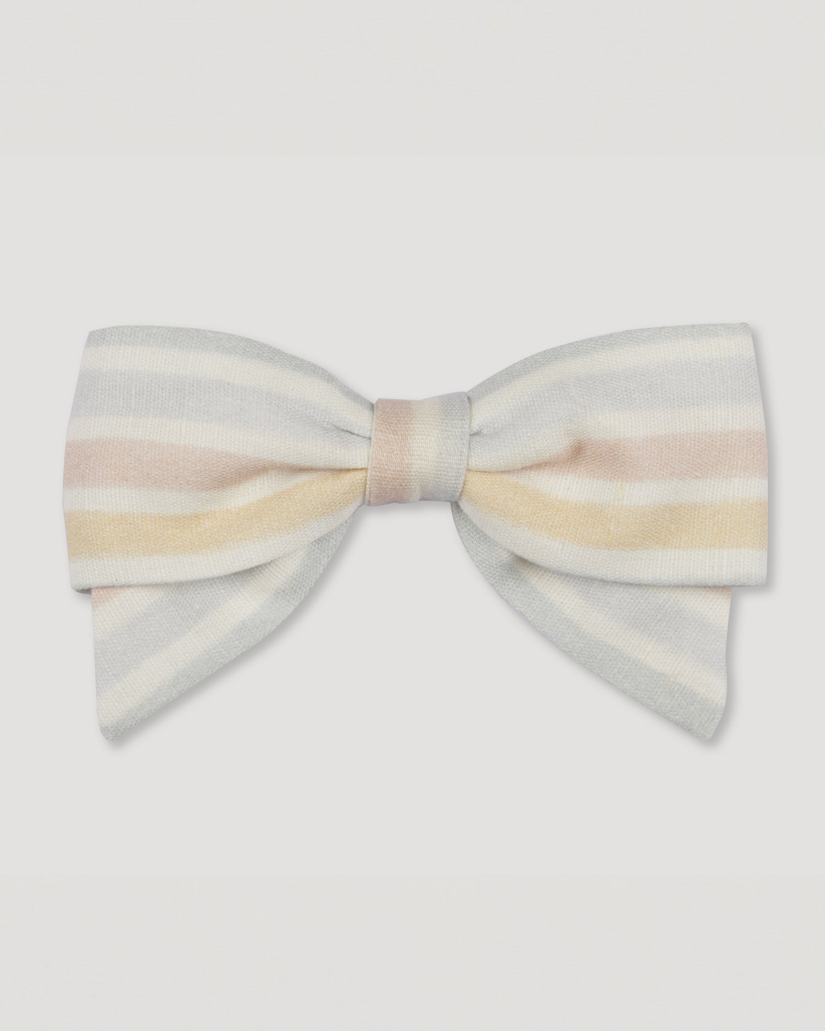Early Sunday, Chiara Alligator Clip in Mini Flower print, made from Printed canvas 70% Cotton 30% Linen fabric, featuring a bow design on an alligator clip with a secure fit, shown in a front flat-lay view