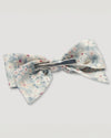 Early Sunday, Chiara Alligator Clip in Amelia print, made from Printed Cotton Cambric fabric, featuring a bow design on an alligator clip with a secure fit, shown in a back flat-lay view