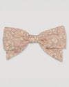 Early Sunday, Chiara Alligator Clip in Garden Flowers print, made from Printed Cotton Cambric fabric, featuring a bow design on an alligator clip with a secure fit, shown in a front flat-lay view