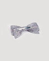 Early Sunday, Chiara Clip in Celestial print, made from Printed 60s Cotton Satin fabric, featuring a bow design on an alligator clip with a secure fit, shown in a back flat-lay view