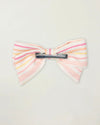 Early Sunday, Chiara Clip in Pink Stripes print, made from Printed 70% Cotton, 30% Linen fabric, featuring a bow design on an alligator clip with a secure fit, shown in a back flat-lay view