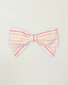 Early Sunday, Chiara Clip in Pink Stripes print, made from Printed 70% Cotton, 30% Linen fabric, featuring a bow design on an alligator clip with a secure fit, shown in a front flat-lay view
