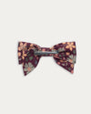 Early Sunday, Chiara Clip in Garden Flowers Plum, made from Printed Cotton Satin fabric, featuring a bow design on an alligator clip with a secure fit, shown in a back flat-lay view
