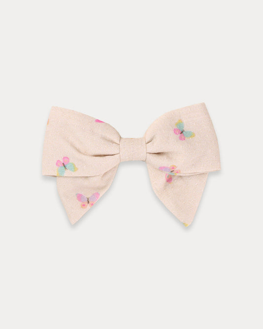Early Sunday, Chiara Clip in Butterflies print, made from Printed Cotton Tiny Swiss Dobby fabric, featuring a bow design on an alligator clip with a secure fit, shown in a front flat-lay view
