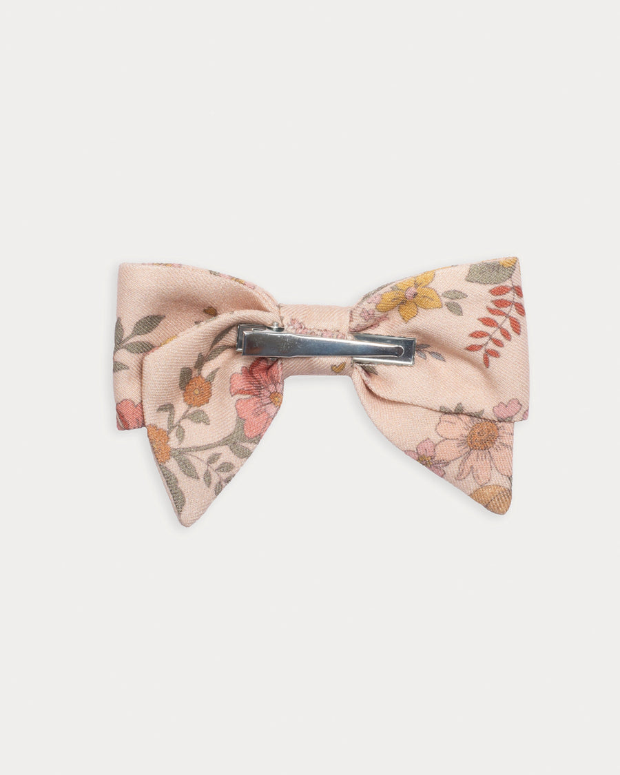 Early Sunday, Chiara Clip in Bloom Blush, made from Printed Viscose Twill fabric, featuring a bow design on an alligator clip with a secure fit, shown in a back flat-lay view