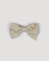 Early Sunday, Chiara Clip in Ditsy Bouquet Jade print, made from Printed Viscose Twill fabric, featuring a bow design on an alligator clip with a secure fit, shown in a front flat-lay view