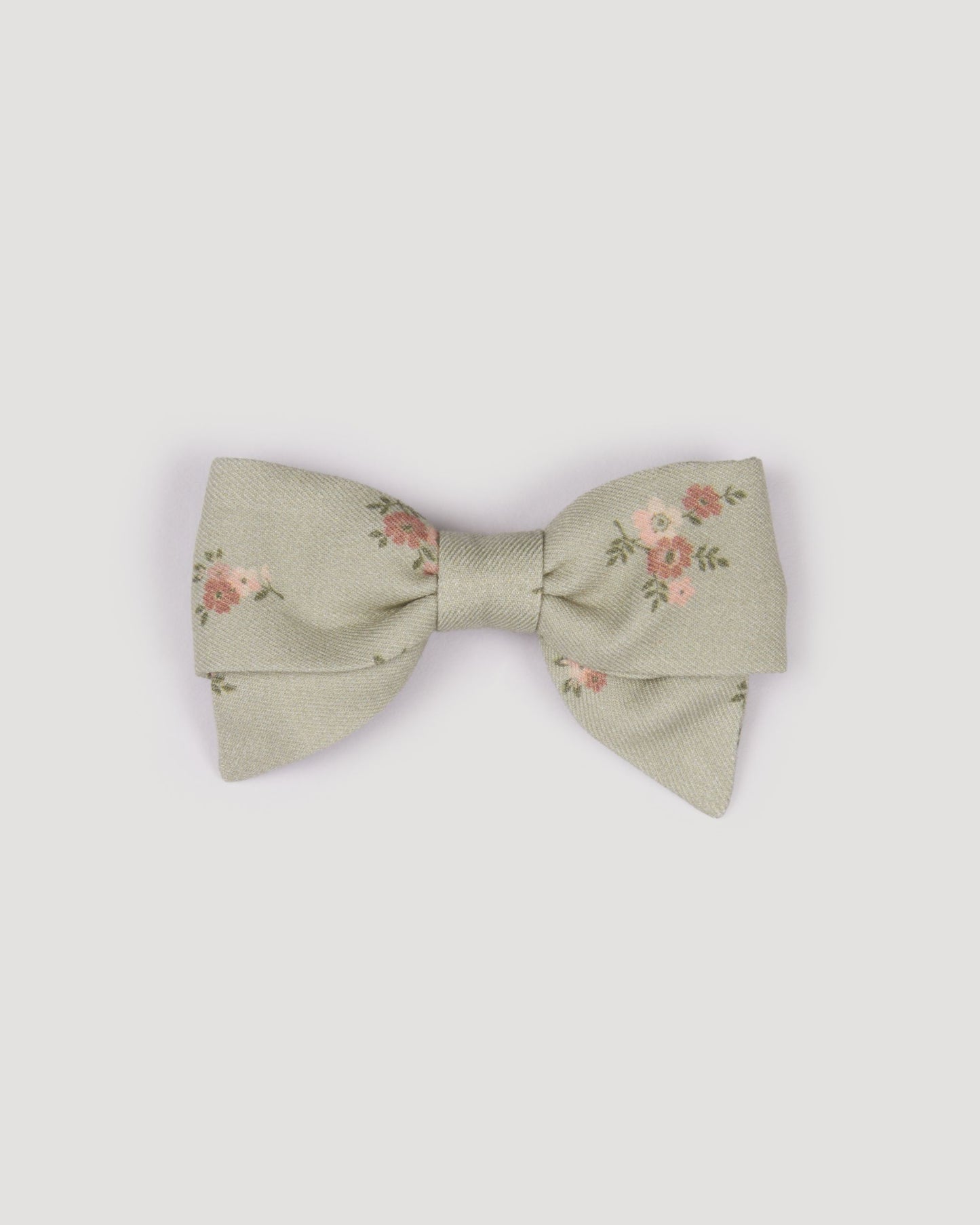 Early Sunday, Chiara Clip in Ditsy Bouquet Jade print, made from Printed Viscose Twill fabric, featuring a bow design on an alligator clip with a secure fit, shown in a front flat-lay view