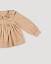 Early Sunday, Colette Blouse in Beige, made from Cotton Satin fabric, featuring relaxed fit, classic collar, and button-down front, shown in a closeup flat-lay view