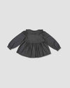 Early Sunday, Colette Blouse in Stormy Blue, made from Cotton Satin fabric, featuring relaxed fit, classic collar, and button-down front, shown in a back flat-lay view