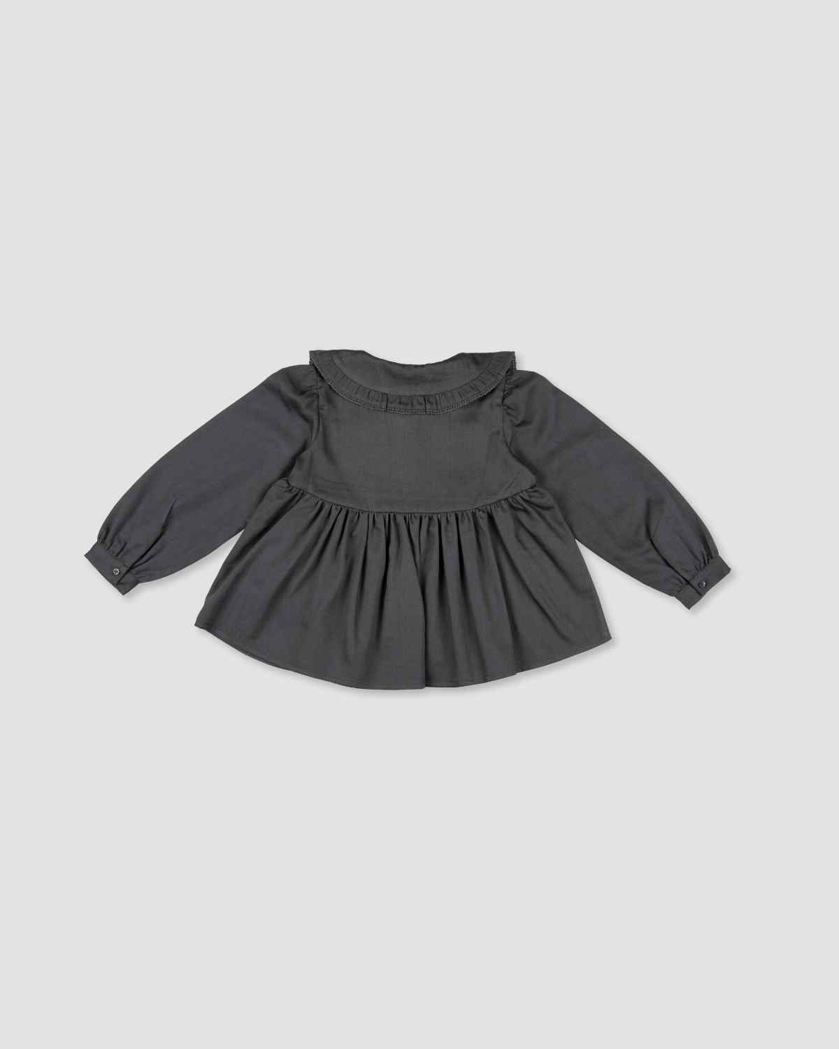 Early Sunday, Colette Blouse in Stormy Blue, made from Cotton Satin fabric, featuring relaxed fit, classic collar, and button-down front, shown in a back flat-lay view