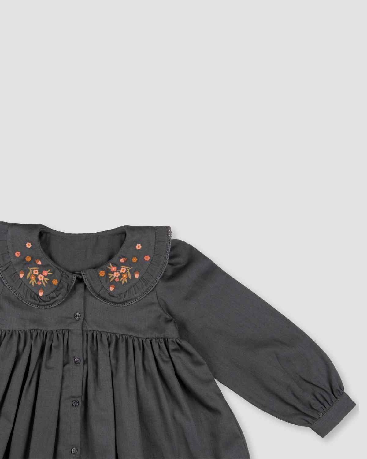 Early Sunday, Colette Blouse in Stormy Blue, made from Cotton Satin fabric, featuring relaxed fit, classic collar, and button-down front, shown in a closeup flat-lay view