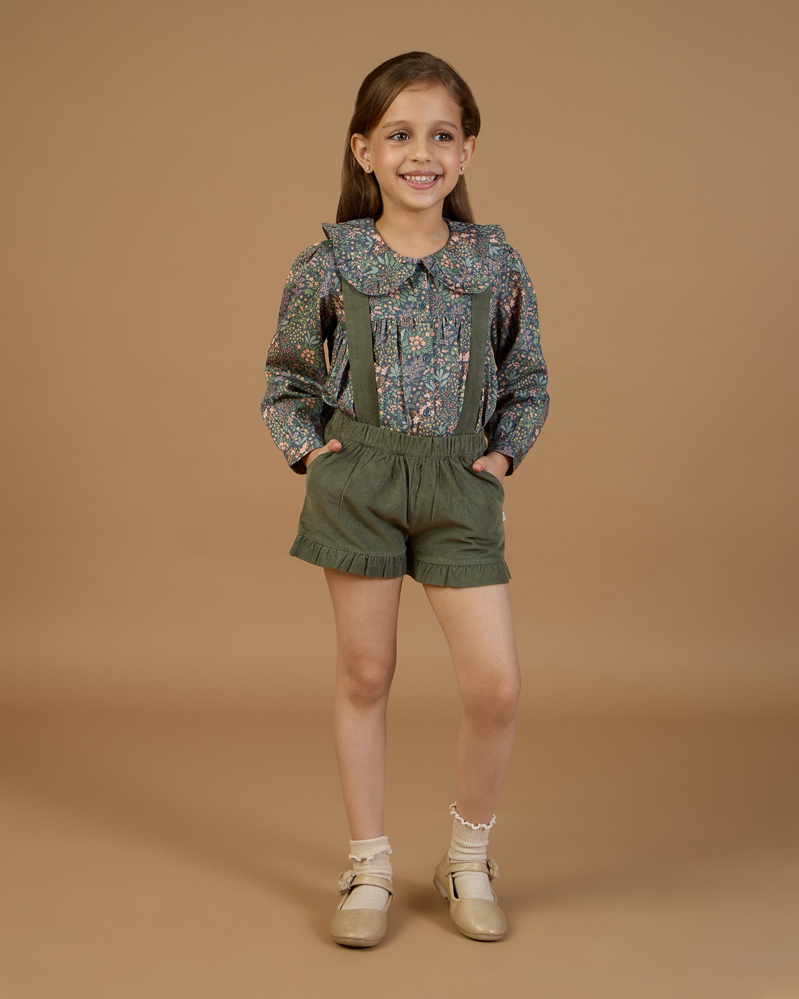Early Sunday, Colette Blouse in Autumn Garden Greyish Blue, made from Printed Cotton Satin fabric, featuring relaxed fit, classic collar, and button-down front, shown in a front view of model wearing it