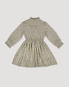 Early Sunday, Dawn Dress in Ditsy Bouquet Jade print, made from Printed Viscose Rayon Twill fabric, featuring Collar and sleeve cuffs trimmed with subtle ruffles for a nostalgic silhouette, shown in a back flat-lay view