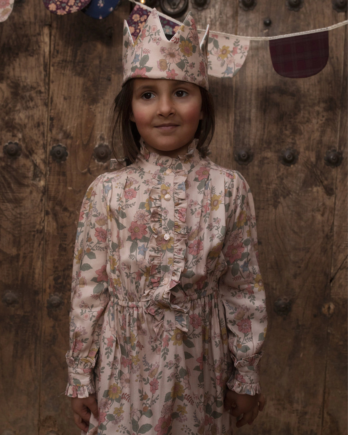 Early Sunday, Dawn Dress in Bloom, made from Printed Viscose Twill fabric, featuring a soft flowing hem, shown in a close up shot of model wearing it
