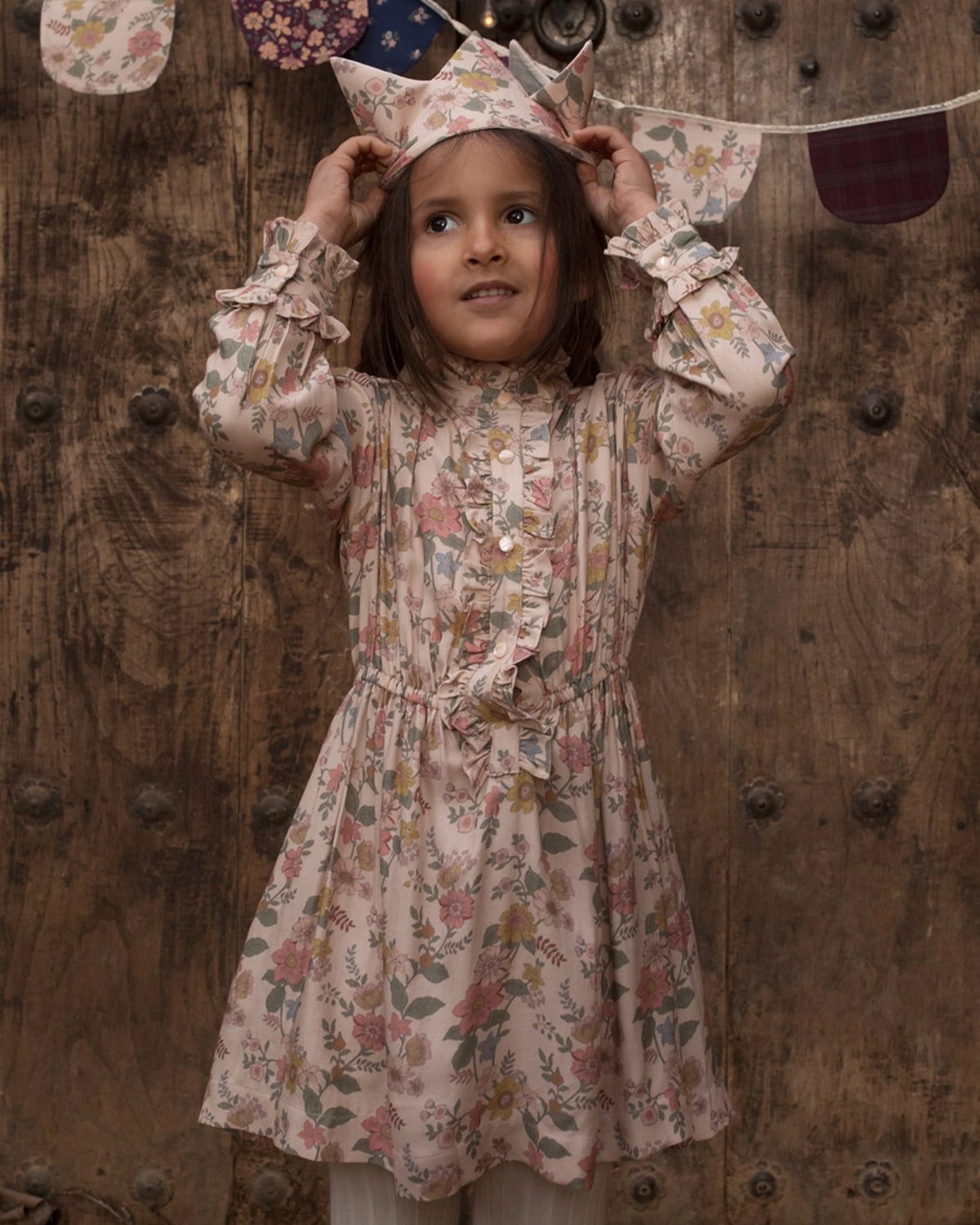 Early Sunday, Dawn Dress in Bloom, made from Printed Viscose Twill fabric, featuring a soft flowing hem, shown in a front view of model wearing it