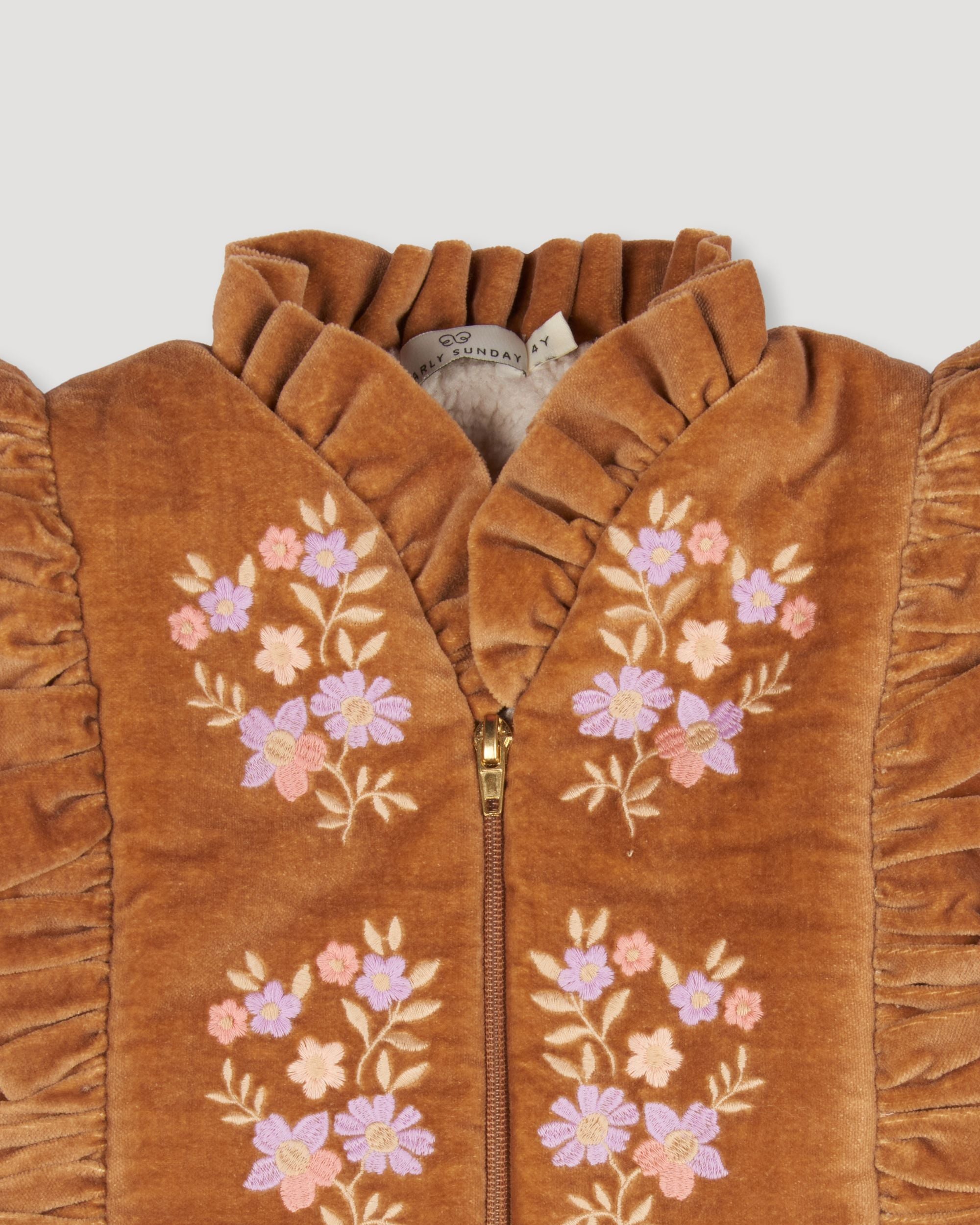 Early Sunday, Deborah Jacket in Almond, made from Dyed Cotton Velvet fabric, featuring Sleeveless design ideal for versatile layering in transitional weather, shown in a closeup flat-lay view
