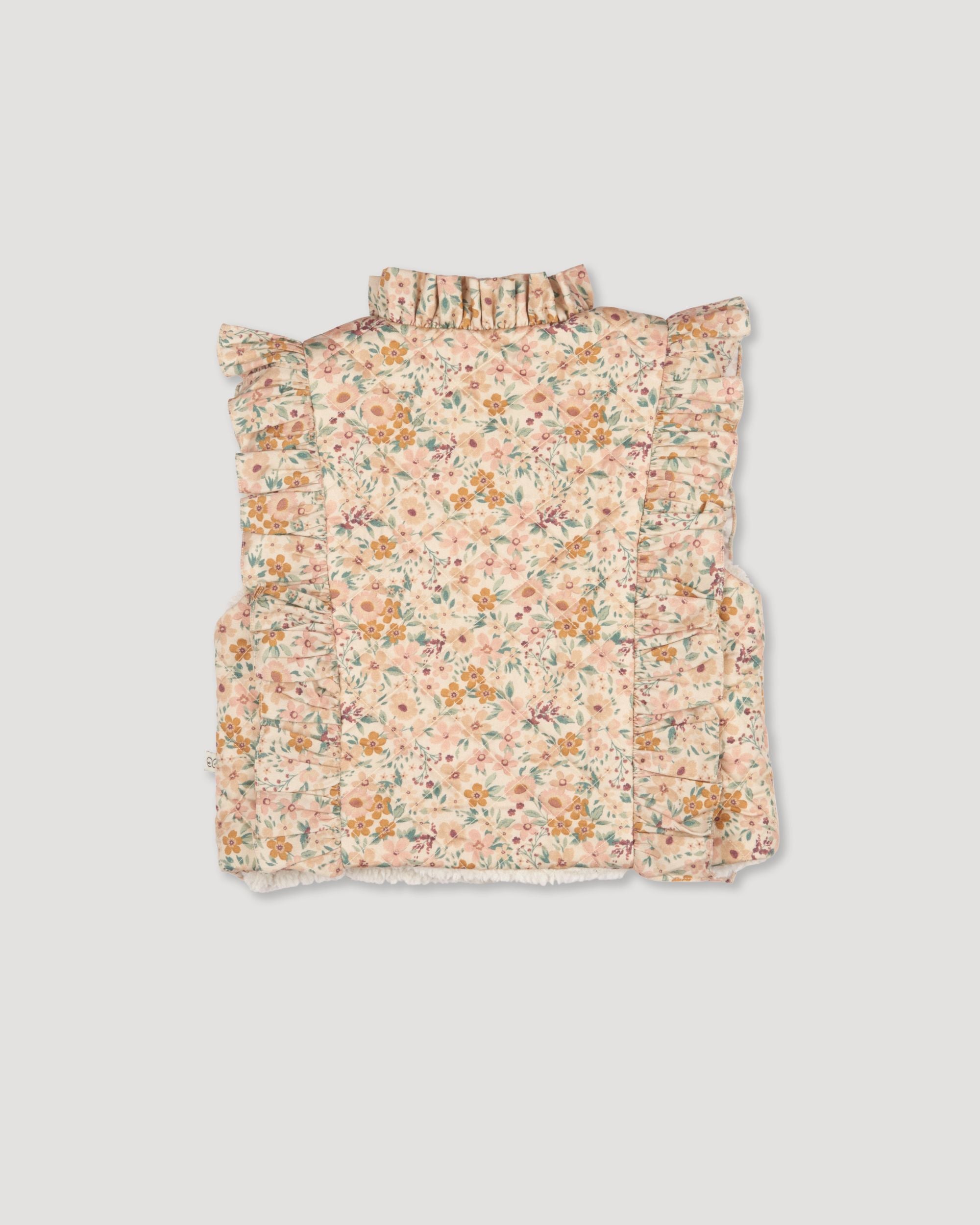 Early Sunday, Deborah Jacket in Floral print, made from Printed 30s Cotton Twill fabric, featuring Sleeveless design ideal for versatile layering in transitional weather, shown in a back flat-lay view