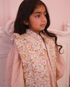 Early Sunday, Deborah Jacket in Floral print, made from Printed 30s Cotton Twill fabric, featuring Sleeveless design ideal for versatile layering in transitional weather, shown in a close up shot of model wearing it
