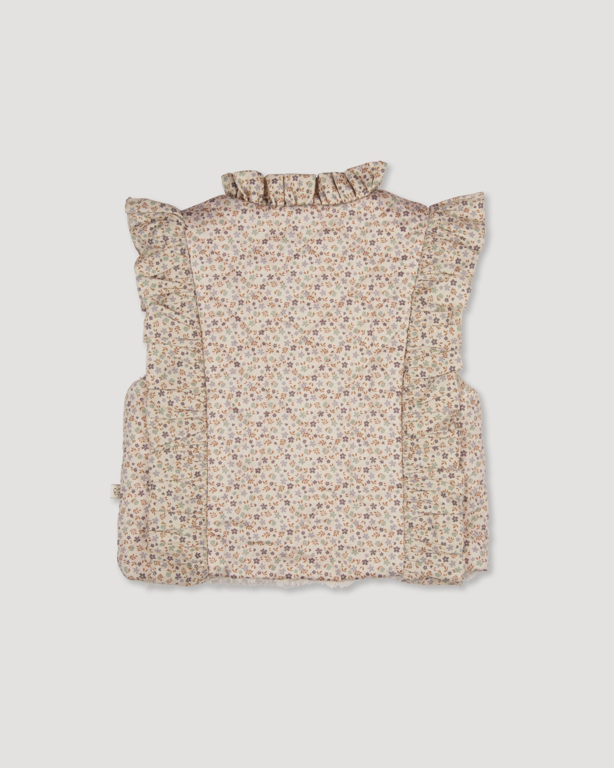 Early Sunday, Deborah Jacket in Miny Flowers print, made from Printed 30s Cotton Twill fabric, featuring Sleeveless design ideal for versatile layering in transitional weather, shown in a back flat-lay view