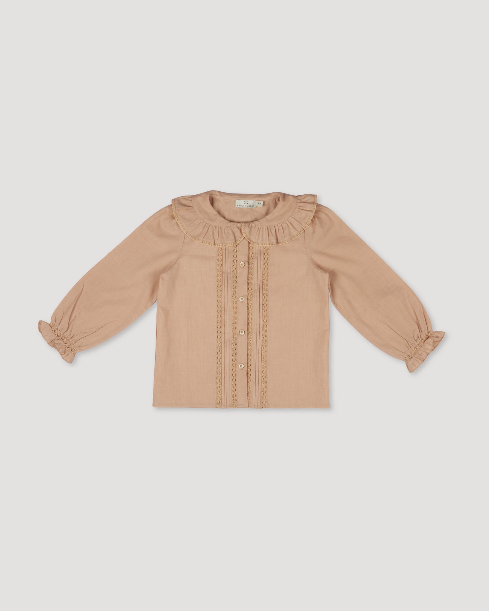 Early Sunday, Ella Blouse in Nude, made from Cotton Cambric fabric, featuring relaxed fit, frill detailing on the collar, and lace inserts, shown in a front flat-lay view