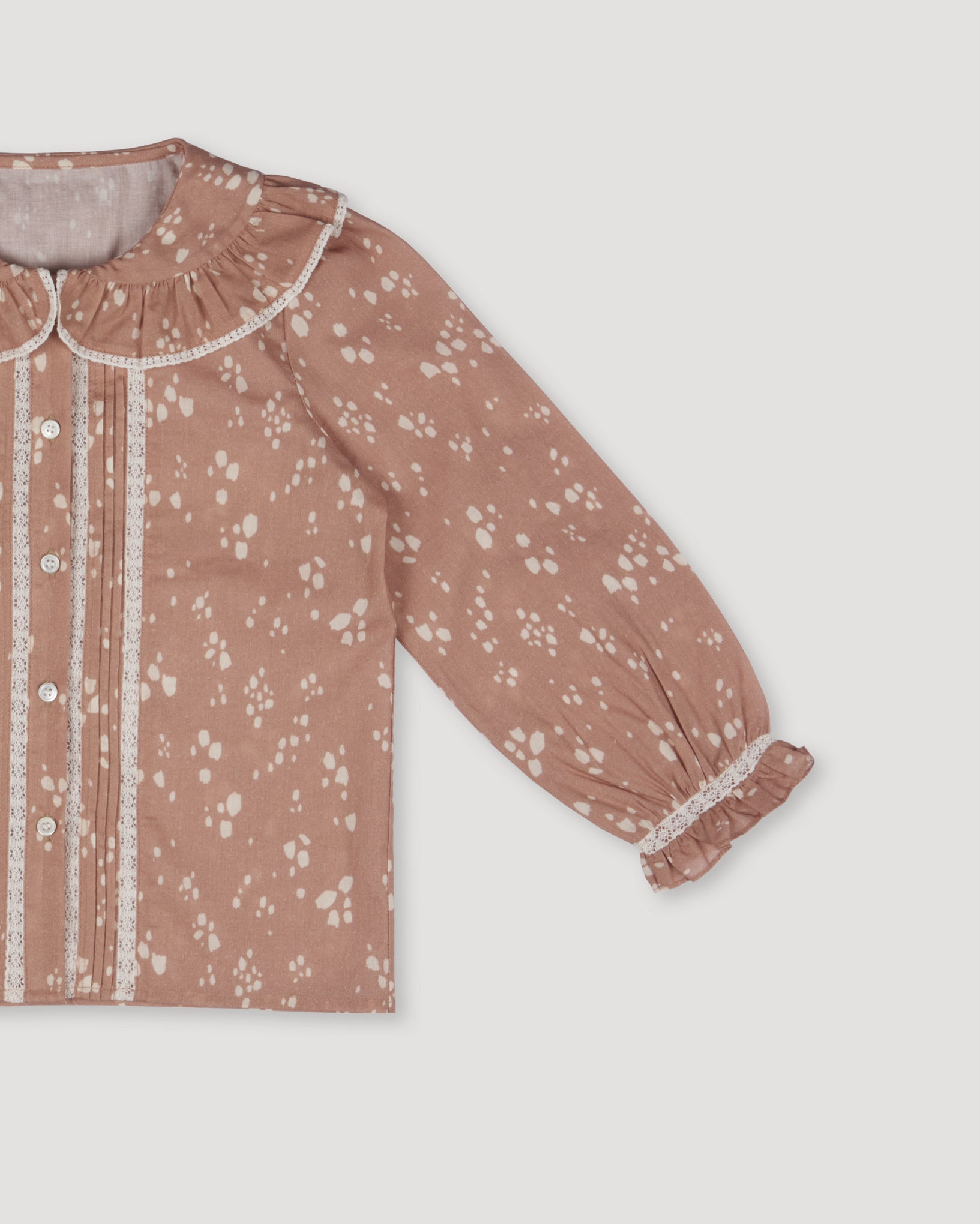 Early Sunday, Ella Blouse in Fawn Soft Pinkish Brown, made from Printed Cotton Cambric fabric, featuring relaxed fit, frill detailing on the collar, and lace inserts, shown in closeup flat-lay view