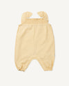 Early Sunday, Emma Baby Smocked Overalls Romper in Vanilla color, made from Cotton Dobby Swiss Dots fabric, featuring a relaxed fit with smocked chest band & frilled sleeves, shown in a back flat-lay view