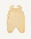 Early Sunday, Emma Baby Smocked Overalls Romper in Vanilla color, made from Cotton Dobby Swiss Dots fabric, featuring a relaxed fit with smocked chest band & frilled sleeves, shown in a front flat-lay view