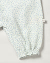 Early Sunday, Emma Baby Smocked Overalls Romper in Mini Flower print, made from Printed canvas 70% Cotton 30% Linen fabric, featuring a relaxed fit with smocked chest band & frilled sleeves, shown in a closeup flat-lay view