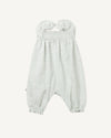 Early Sunday, Emma Baby Smocked Overalls Romper in Mini Flower print, made from Printed canvas 70% Cotton 30% Linen fabric, featuring a relaxed fit with smocked chest band & frilled sleeves, shown in a front flat-lay view