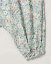 Early Sunday, Emma Baby Smocked Overalls Romper in Amelia print, made from Printed Cotton Cambric fabric, featuring a relaxed fit with smocked chest band & frilled sleeves, shown in a closeup flat-lay view