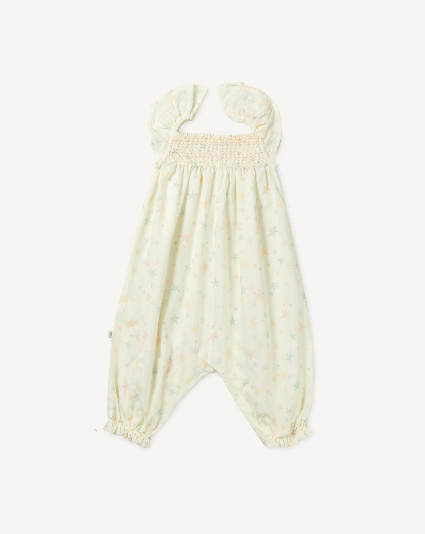 Early Sunday, Emma Baby Smocked Overalls Romper in Star Fish print, made from Printed Cotton Cambric fabric, featuring a relaxed fit with smocked chest band & frilled sleeves, shown in a back flat-lay view