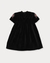 Early Sunday, Erika Dress in Black, made from Cotton Velvet Velour's fabric, featuring a beautiful embroidery with frilled neckline, shown in a back flat-lay view