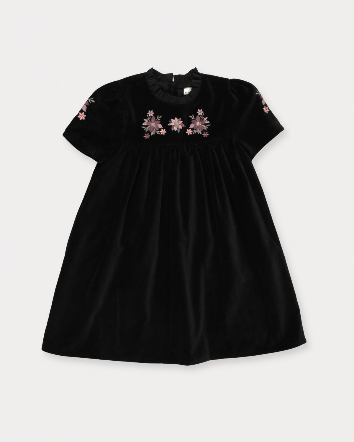 Early Sunday, Erika Dress in Black, made from Cotton Velvet Velour's fabric, featuring a beautiful embroidery with frilled neckline, shown in a front flat-lay view