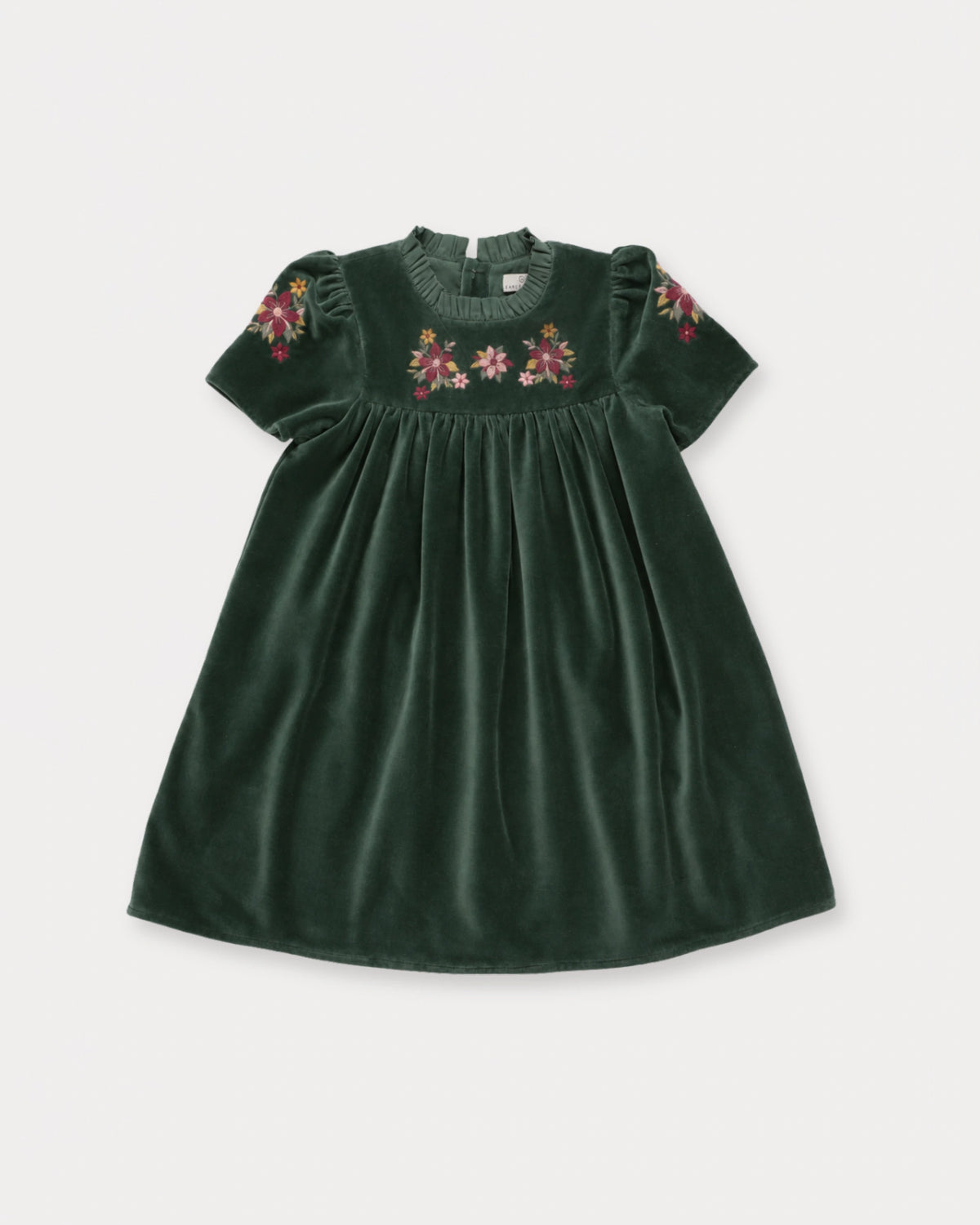 Early Sunday, Erika Dress in Forest Green, made from Cotton Velvet Velour's fabric, featuring a beautiful embroidery with frilled neckline, shown in a front flat-lay view