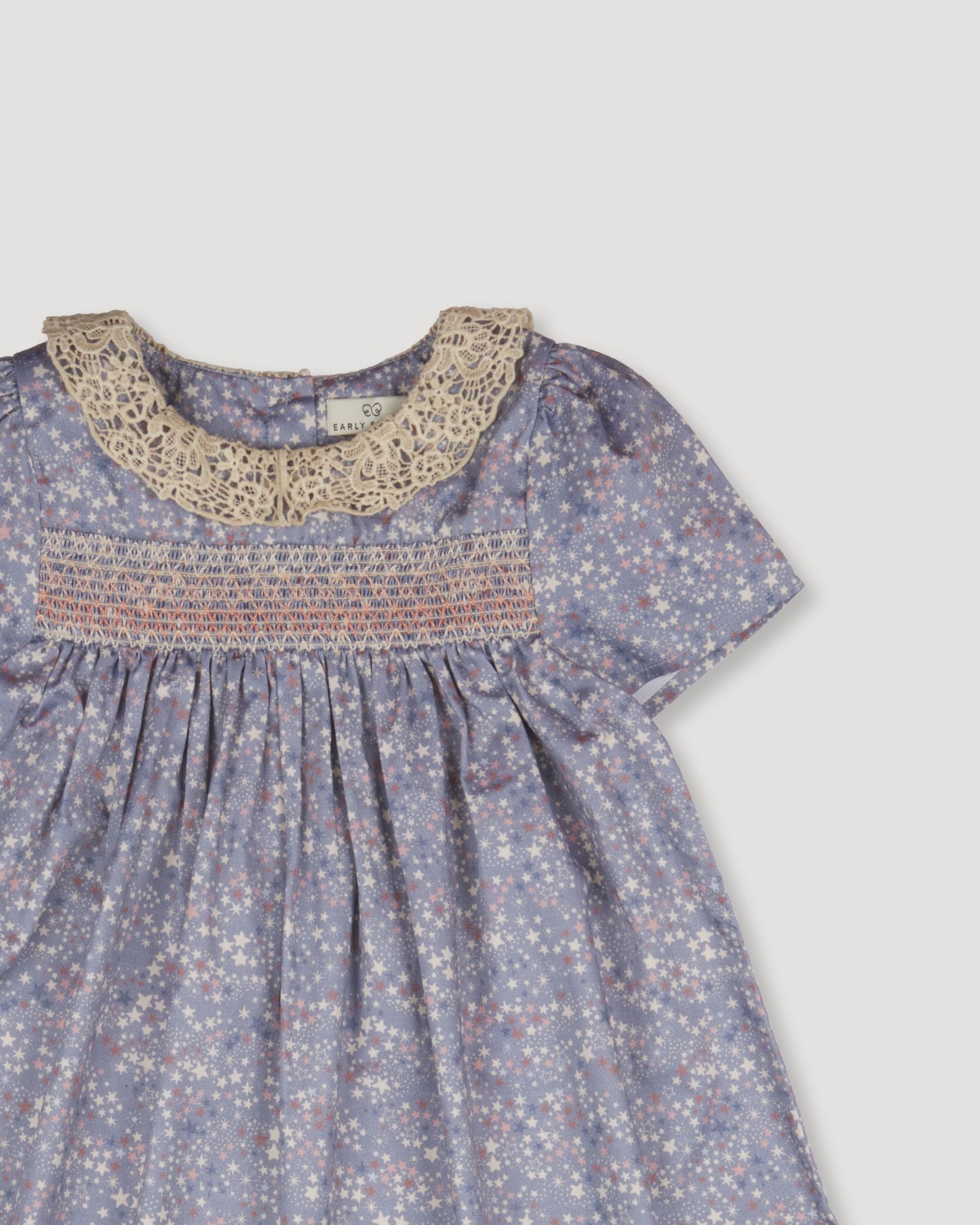 Early Sunday, Erika Dress in Celestial print, made from Printed Cotton Satin fabric, featuring Flowy A-line silhouette allows ease of movement and day-long comfort, shown in a closeup flat-lay view