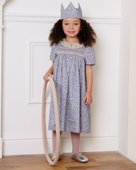 Early Sunday, Erika Dress in Celestial print, made from Printed Cotton Satin fabric, featuring Flowy A-line silhouette allows ease of movement and day-long comfort, shown in a front view of model wearing it