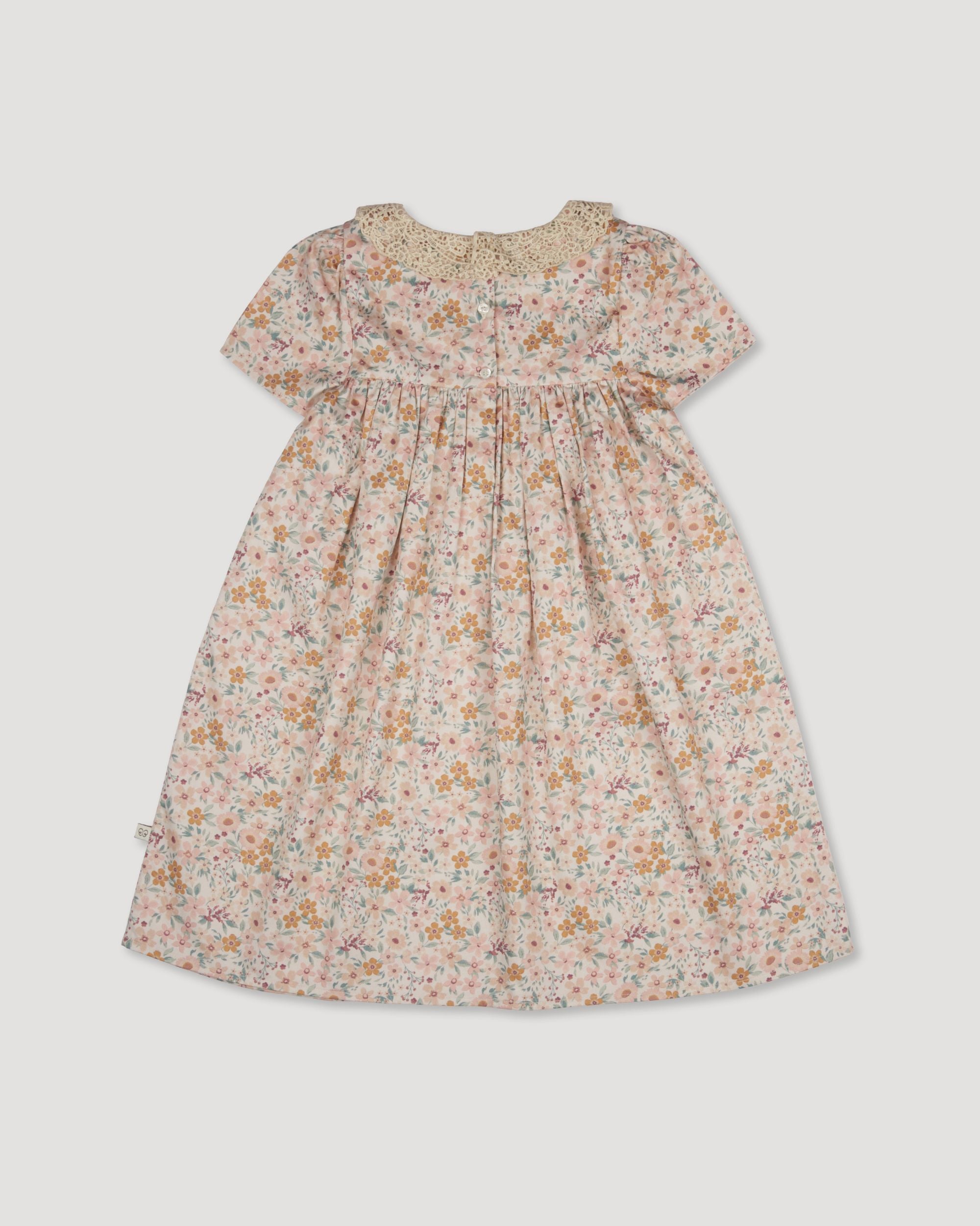 Early Sunday, Erika Dress in Floral print, made from Printed Cotton Satin fabric, featuring Flowy A-line silhouette allows ease of movement and day-long comfort, shown in a back flat-lay view