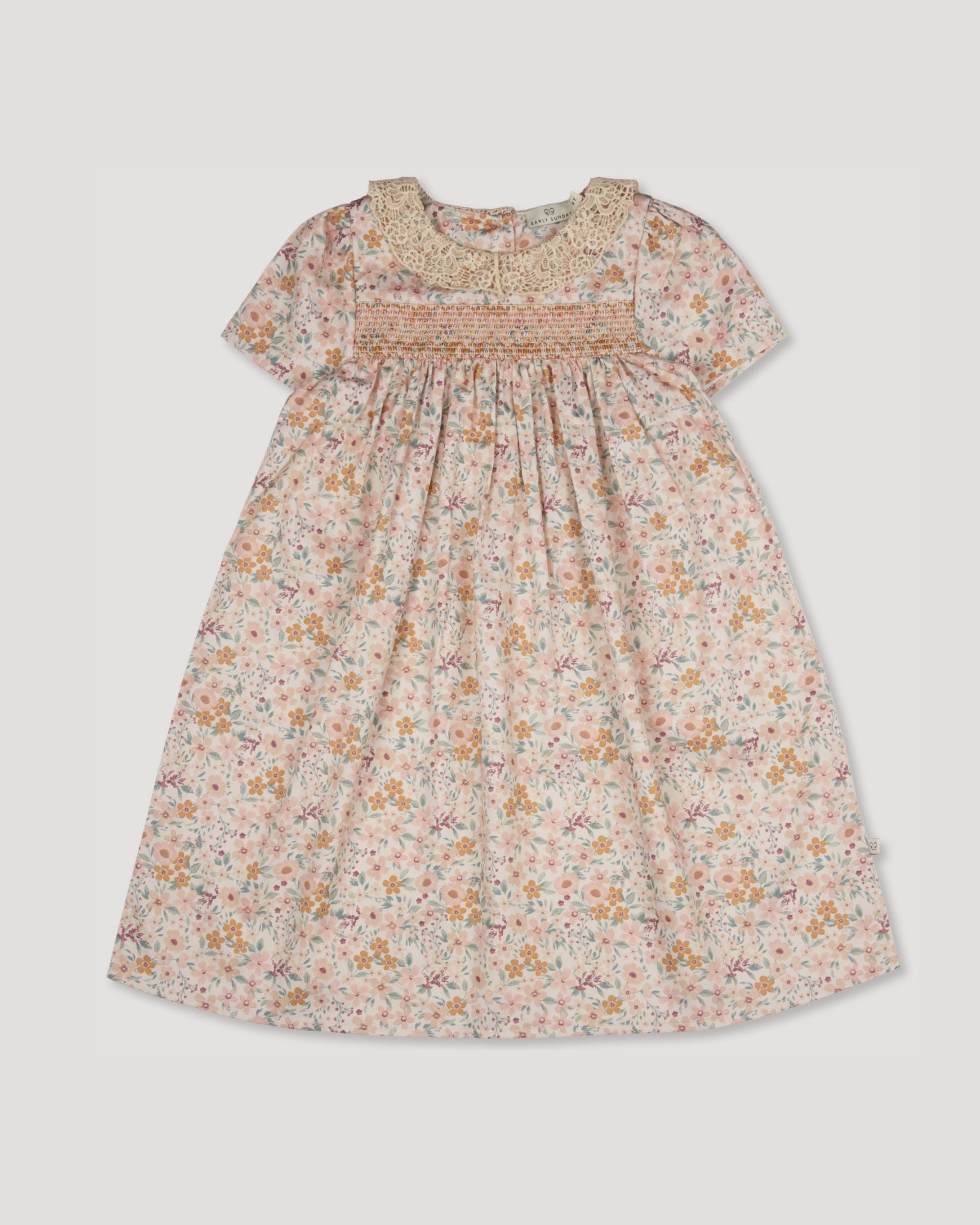 Early Sunday, Erika Dress in Floral print, made from Printed Cotton Satin fabric, featuring Flowy A-line silhouette allows ease of movement and day-long comfort, shown in a front flat-lay view
